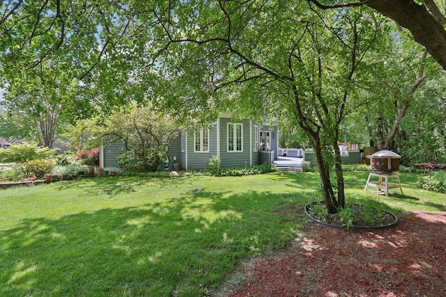 688 Fox Holw, Dekalb, IL 60115 - view of grassy yard featuring a wooden deck