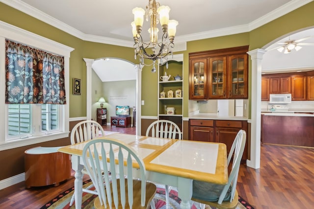 688 Fox Holw, Dekalb, IL 60115 - dining space with arched walkways, ornate columns, dark wood-style flooring, a chandelier, and ornamental molding