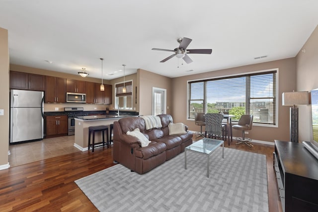 935 Burlington Ave Unit 411, Downers Grove, IL 60515 - living area with wood finished floors and ceiling fan