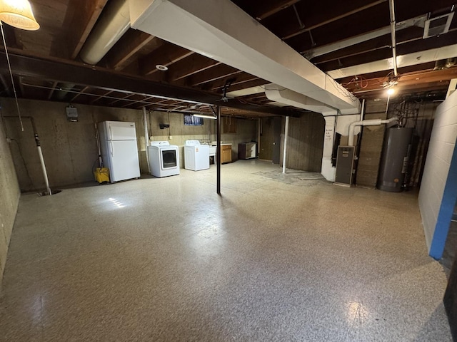 1106 Frederick St, Joliet, IL 60435 - unfinished basement with gas water heater, freestanding refrigerator, washing machine and clothes dryer, and heating unit