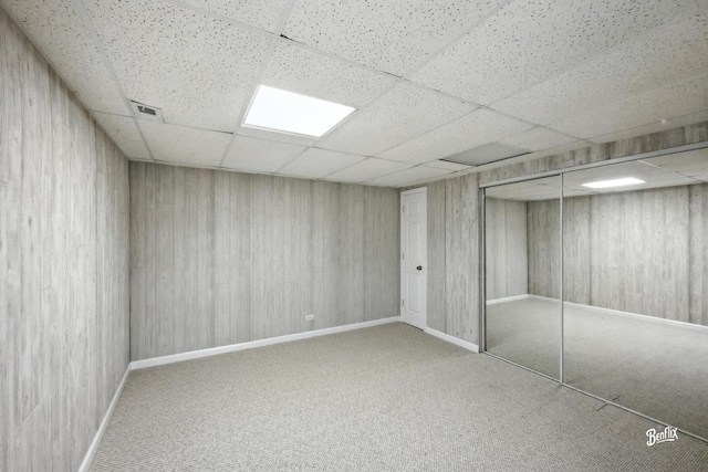 240 Taylor Ct, Buffalo Grove, IL 60089 - finished basement with a paneled ceiling and carpet floors