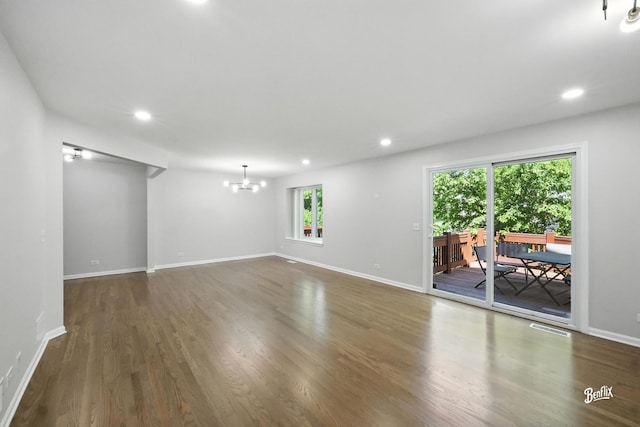 240 Taylor Ct, Buffalo Grove, IL 60089 - empty room with a chandelier, wood finished floors, and recessed lighting