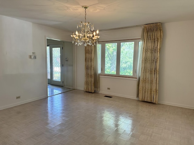 56 Graymoor Ln, Olympia Fields, IL 60461 - empty room featuring a chandelier and baseboards