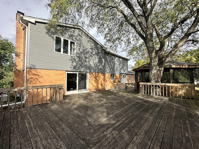56 Graymoor Ln, Olympia Fields, IL 60461 - wooden deck with a sunroom