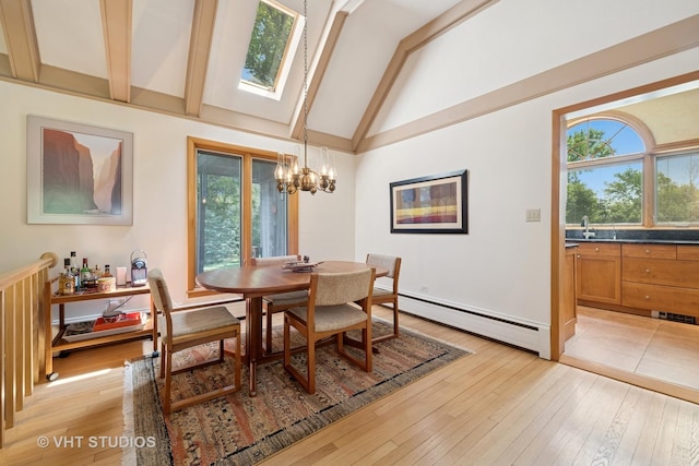 130 Old Dundee Rd, Barrington Hills, IL 60010 - dining room with a baseboard radiator, a chandelier, beam ceiling, light wood-type flooring, and high vaulted ceiling