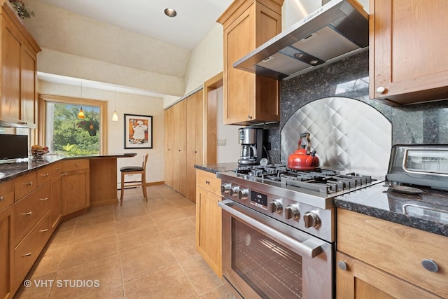 130 Old Dundee Rd, Barrington Hills, IL 60010 - kitchen with high end stove, range hood, backsplash, light tile patterned flooring, and dark stone countertops