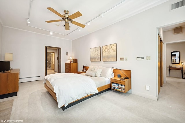 130 Old Dundee Rd, Barrington Hills, IL 60010 - bedroom with rail lighting, a baseboard heating unit, light colored carpet, and a ceiling fan
