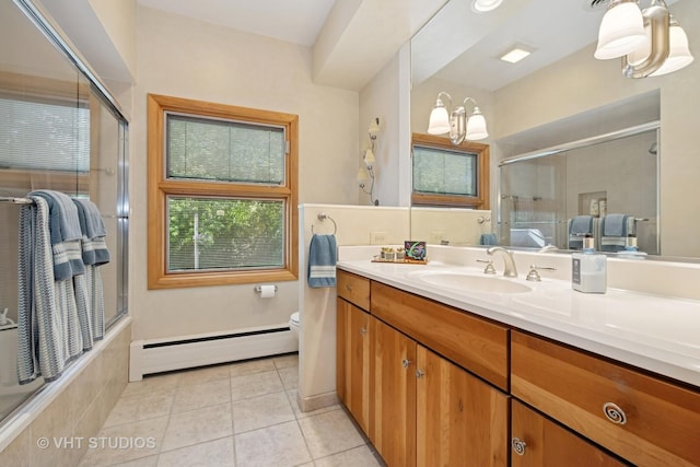 130 Old Dundee Rd, Barrington Hills, IL 60010 - full bathroom with a baseboard heating unit, a tile shower, tile patterned floors, and vanity