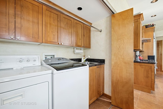 130 Old Dundee Rd, Barrington Hills, IL 60010 - laundry room featuring washing machine and dryer, cabinet space, light tile patterned flooring, and recessed lighting