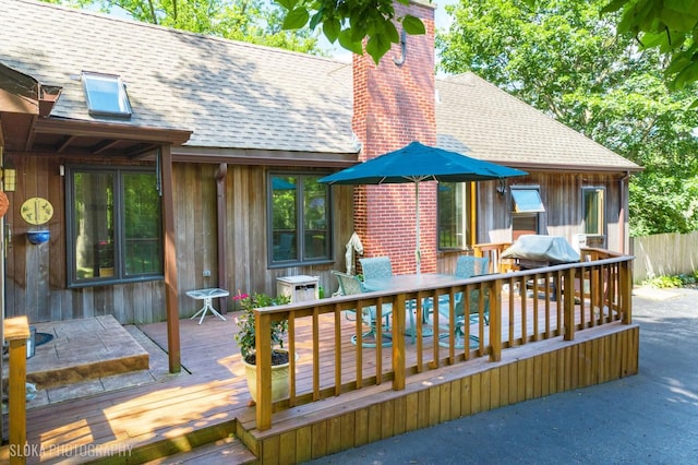 130 Old Dundee Rd, Barrington Hills, IL 60010 - wooden terrace with area for grilling and outdoor dining space