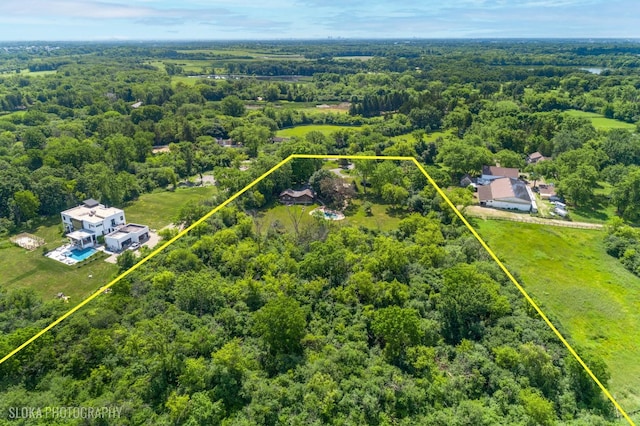 130 Old Dundee Rd, Barrington Hills, IL 60010 - aerial view of property and surrounding area featuring property boundaries highlighted and a heavily wooded area