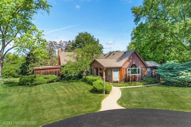 130 Old Dundee Rd, Barrington Hills, IL 60010 - view of front of home with a front yard, a sunroom, and a chimney