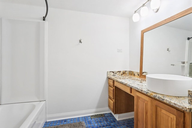 26931 W Marion Ct, Ingleside, IL 60041 - bathroom featuring vanity, tile patterned floors, and tub / shower combination