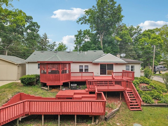 26931 W Marion Ct, Ingleside, IL 60041 - back of property featuring a wooden deck, stairway, a yard, and a shingled roof
