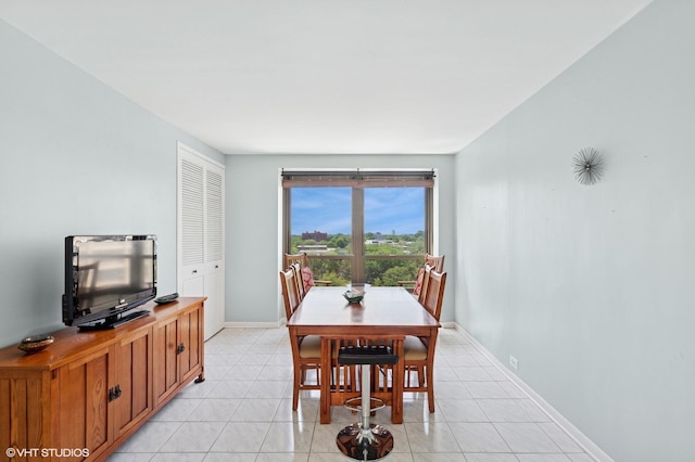 5050 S E End Ave Unit 9C, Chicago, IL 60615 - dining area featuring light tile patterned floors