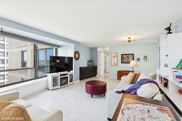 5050 S E End Ave Unit 9C, Chicago, IL 60615 - living room featuring light tile patterned floors and baseboards