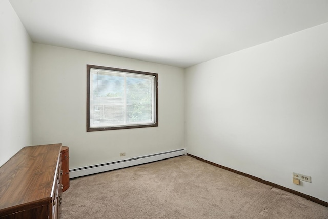 18205 Hart Dr Unit 2B, Homewood, IL 60430 - spare room with baseboard heating and light carpet