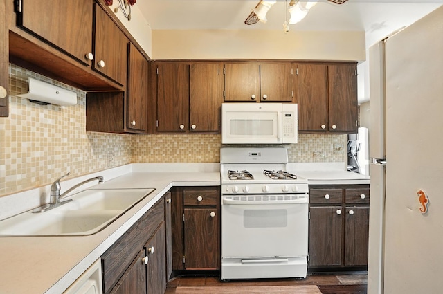 18205 Hart Dr Unit 2B, Homewood, IL 60430 - kitchen with white appliances, tasteful backsplash, light countertops, and a ceiling fan