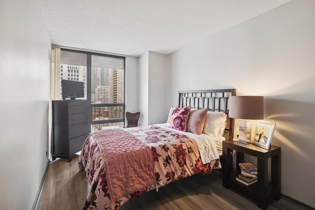 10 E Ontario St Unit 1304, Chicago, IL 60611 - bedroom featuring wood finished floors and a textured ceiling