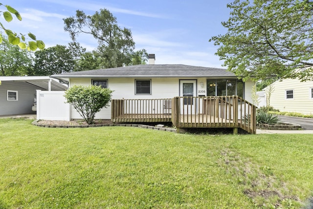 2306 Webster Ave, Joliet, IL 60436 - rear view of house featuring a deck, a lawn, and a chimney