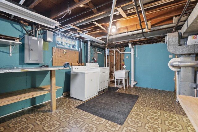2306 Webster Ave, Joliet, IL 60436 - below grade area featuring washing machine and dryer, electric panel, and tile patterned floors
