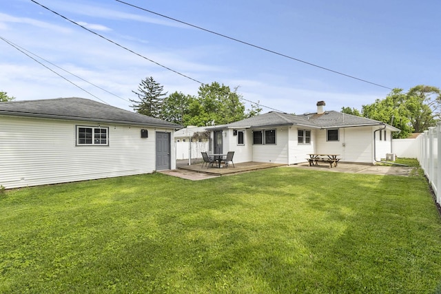2306 Webster Ave, Joliet, IL 60436 - rear view of property with a fenced backyard and a patio area