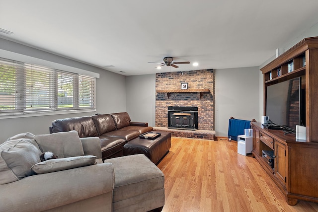 8941 Timothy Ct, Orland Park, IL 60462 - living area with a ceiling fan, light wood finished floors, recessed lighting, and a brick fireplace