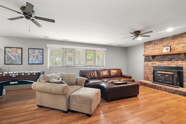 8941 Timothy Ct, Orland Park, IL 60462 - living room with ceiling fan, wood finished floors, and a fireplace