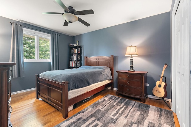 8941 Timothy Ct, Orland Park, IL 60462 - bedroom with wood finished floors and a ceiling fan