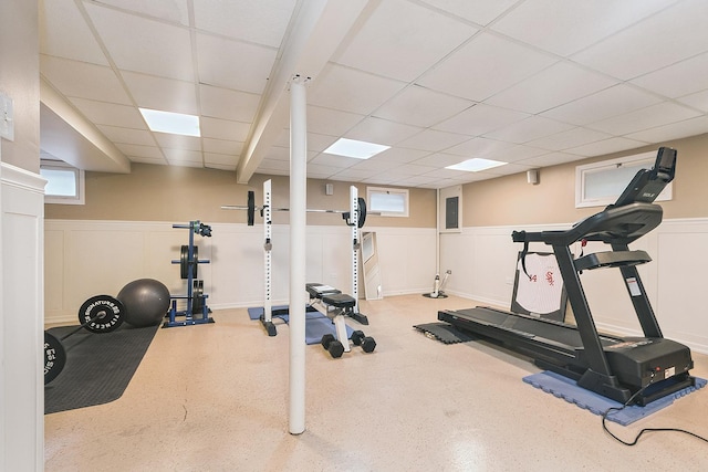 8941 Timothy Ct, Orland Park, IL 60462 - workout area featuring a drop ceiling, a wainscoted wall, plenty of natural light, electric panel, and a decorative wall
