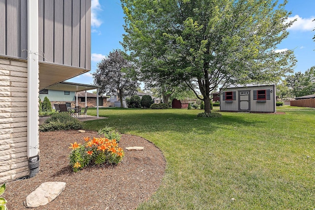 8941 Timothy Ct, Orland Park, IL 60462 - view of grassy yard featuring a storage shed and a patio area