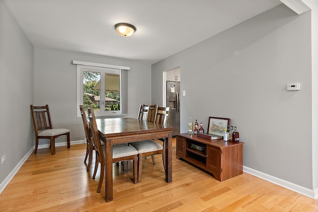 8941 Timothy Ct, Orland Park, IL 60462 - dining room with light wood-style flooring and baseboards