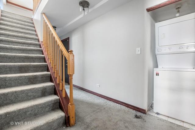 212 E 44th St Unit 2, Chicago, IL 60653 - staircase featuring stacked washing machine and dryer and carpet