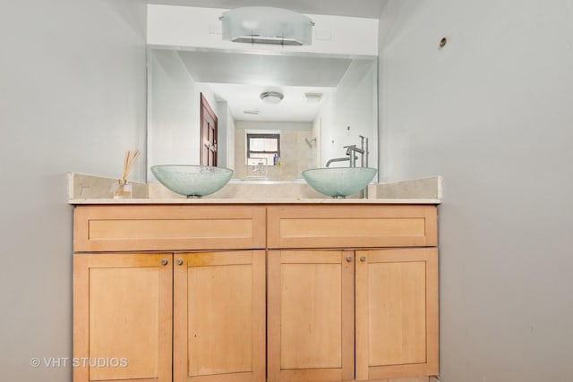 212 E 44th St Unit 2, Chicago, IL 60653 - bathroom featuring double vanity