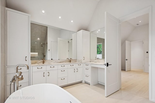 759 Strawberry Hill Dr, Glencoe, IL 60022 - full bath featuring vaulted ceiling, double vanity, a soaking tub, tiled shower, and recessed lighting
