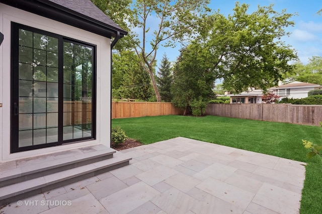 759 Strawberry Hill Dr, Glencoe, IL 60022 - fenced backyard with a patio area