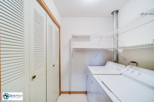 10825 Kathleen Ct Unit D, Palos Hills, IL 60465 - laundry area with separate washer and dryer and baseboards