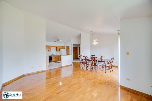 10825 Kathleen Ct Unit D, Palos Hills, IL 60465 - dining space featuring lofted ceiling, light wood finished floors, and ceiling fan