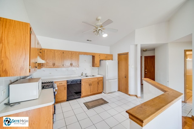 10825 Kathleen Ct Unit D, Palos Hills, IL 60465 - kitchen featuring white appliances, vaulted ceiling, under cabinet range hood, ceiling fan, and light countertops