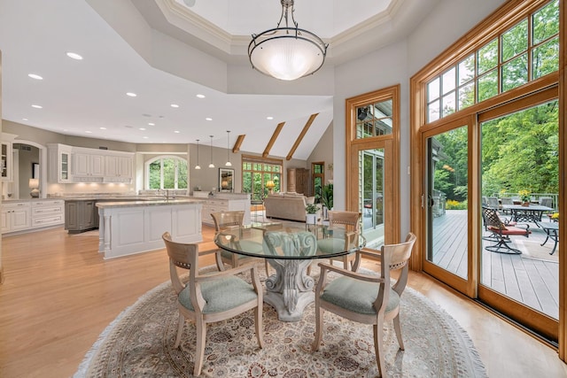 8698 S Madison St, Burr Ridge, IL 60527 - dining area with a towering ceiling, light wood finished floors, recessed lighting, and ornamental molding