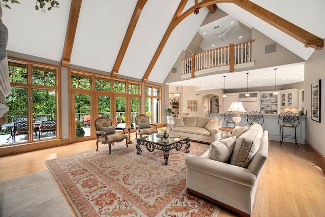 8698 S Madison St, Burr Ridge, IL 60527 - living area featuring high vaulted ceiling, beamed ceiling, recessed lighting, and light wood-type flooring