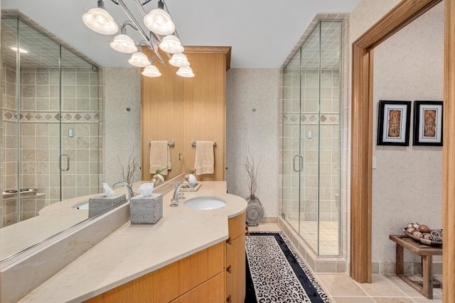 8698 S Madison St, Burr Ridge, IL 60527 - bathroom with vanity, a stall shower, a chandelier, and tile patterned flooring