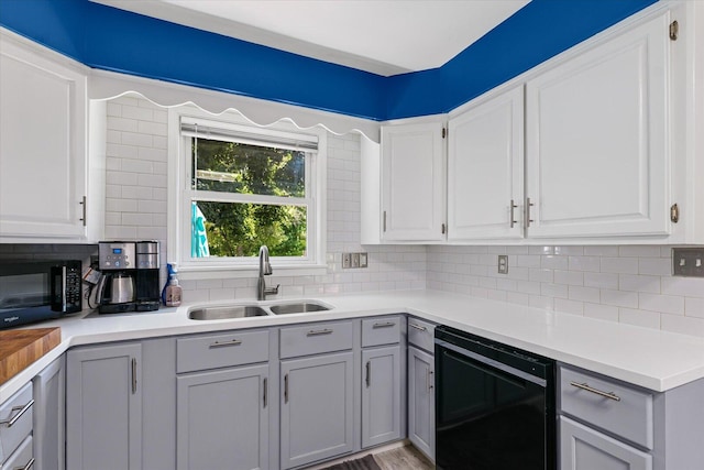 501 N Center St, Colfax, IL 61728 - kitchen with black appliances, gray cabinetry, and backsplash