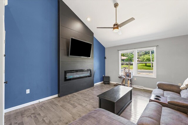 501 N Center St, Colfax, IL 61728 - kitchen with black microwave, light countertops, tasteful backsplash, and white cabinets