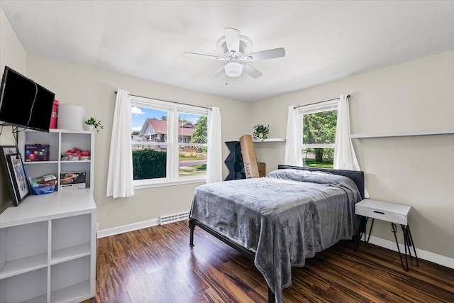 501 N Center St, Colfax, IL 61728 - bedroom featuring wood finished floors and a ceiling fan