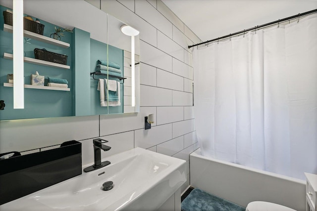 501 N Center St, Colfax, IL 61728 - full bath with tile walls, shower / bath combination with curtain, and vanity