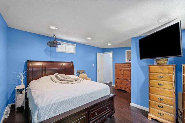 501 N Center St, Colfax, IL 61728 - bedroom with dark wood finished floors and recessed lighting