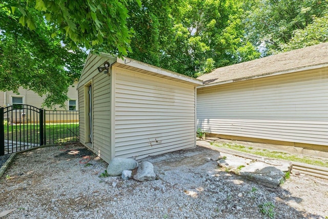501 N Center St, Colfax, IL 61728 - view of shed featuring a gate