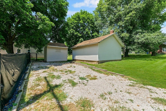 501 N Center St, Colfax, IL 61728 - garage featuring a storage shed