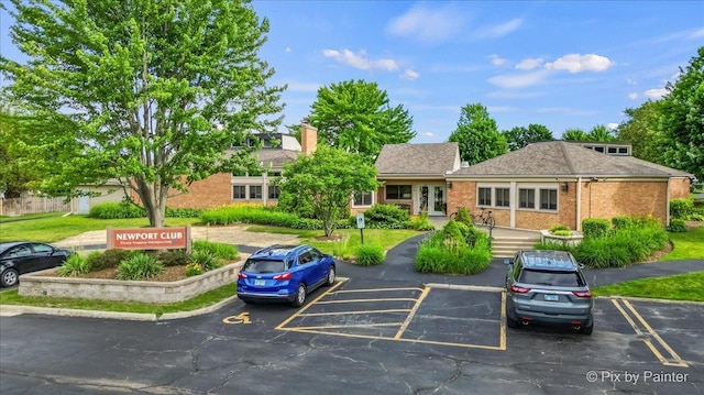 521 Nebraska Cir, Carol Stream, IL 60188 - view of front of home featuring uncovered parking and brick siding